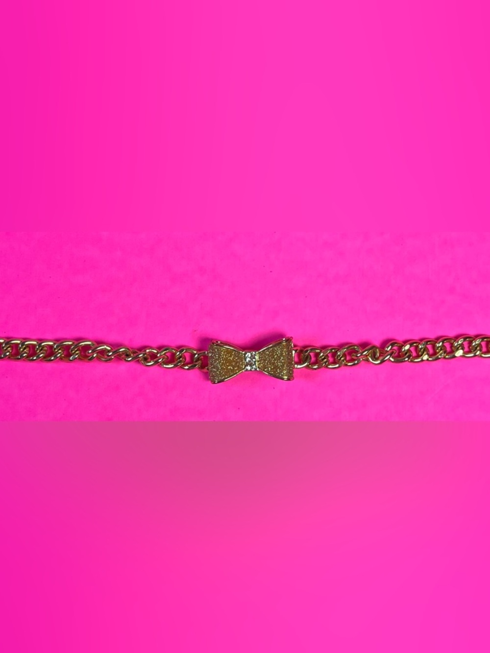 Gold GUESS Bow bracelet